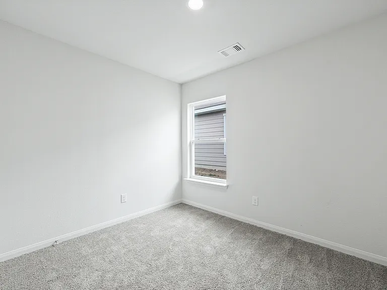 The flex room of the Sabine is a great space for an at-home office, playroom or guest room.
