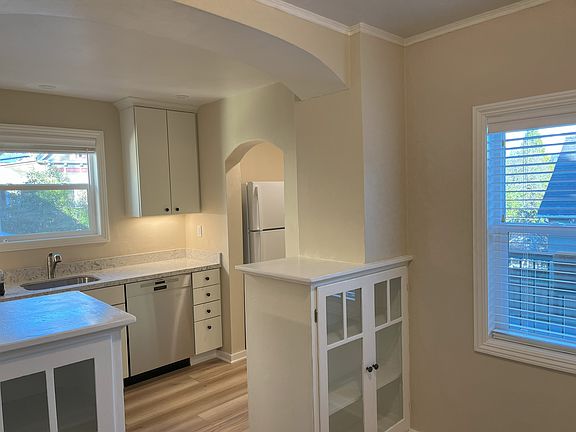 View from Dining Room with craftsman-style cabinets