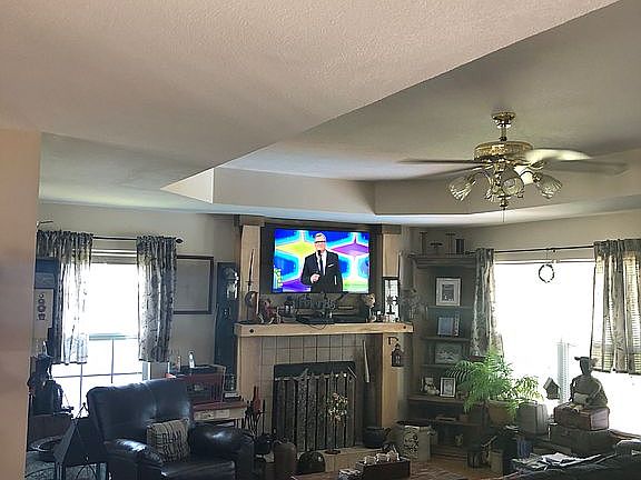 Living room w/wood fireplace