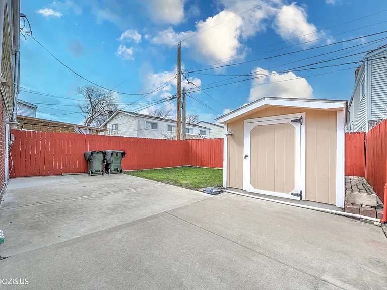 Concrete Patio and Storage Shed