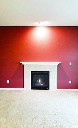 Vibrant colors along with the gas fireplace are sure to make thi