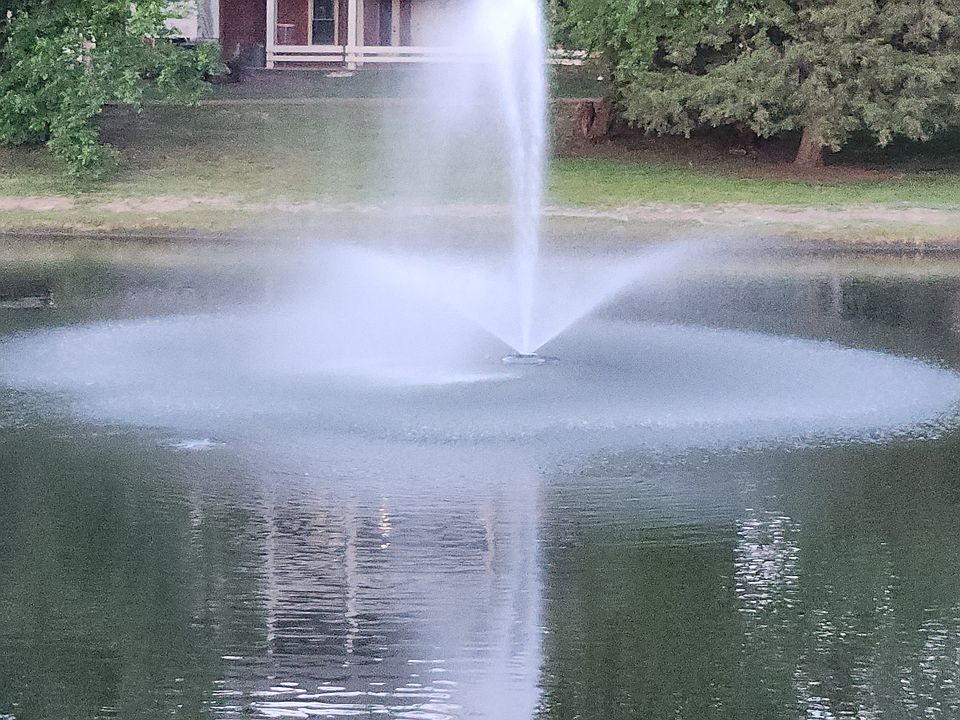Fountain in stocked lake