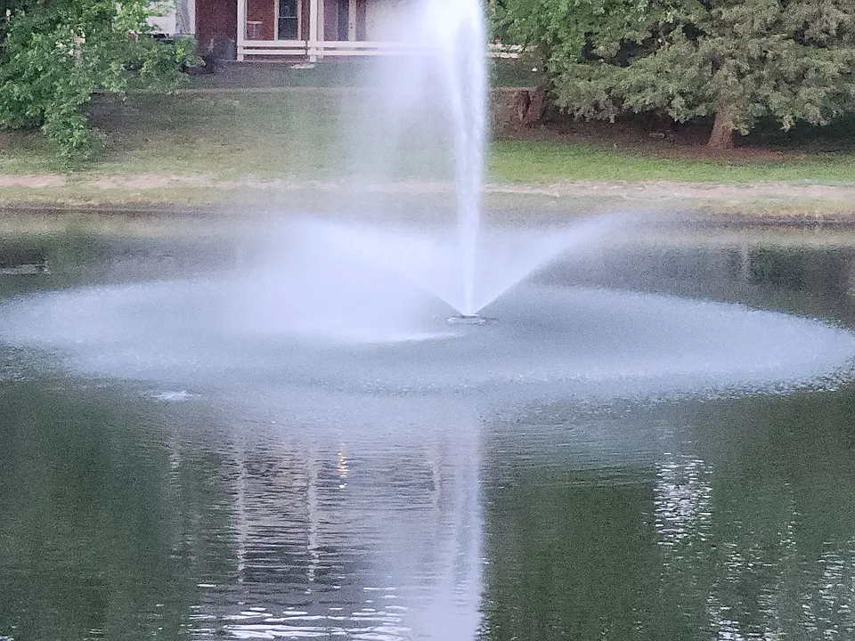 Fountain in stocked lake