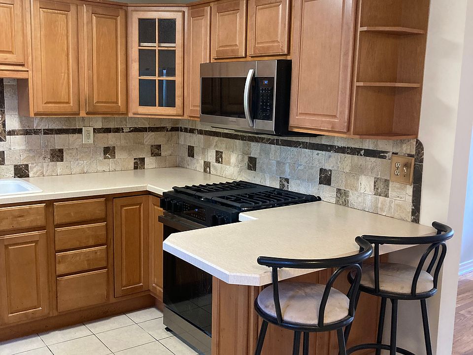 Very functional kitchen with plenty of storage and counter space