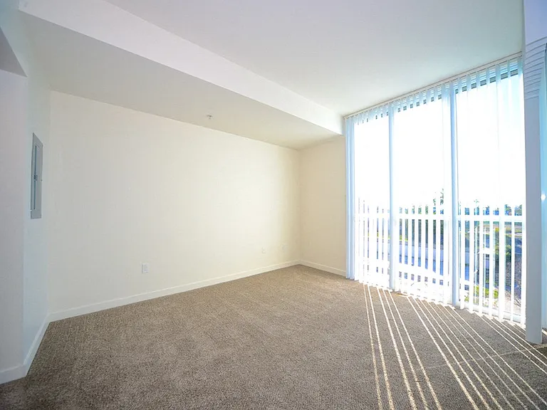 Master bedroom with balcony access and great view at 12th Street Lofts in National City, California.