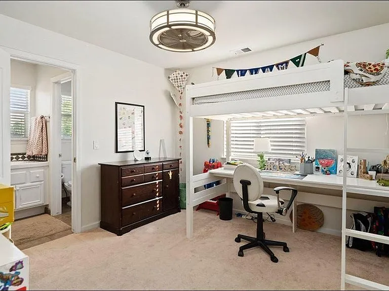 Room with access to bathroom.