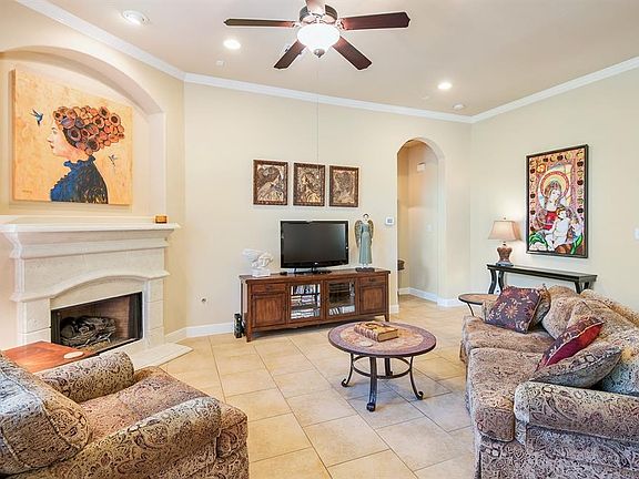 Delightful Family Living. Beautiful Corner, Cast Stone Fireplace with Gas Logs Adds Just a Touch of Elegance and Charm. Picture Windows Provide Great Natural Light! Extra Features include; Pre-Wired for Surround Sound, Accent Lighting and Ceiling Fan