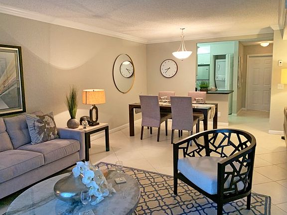 Living room with open concept layout dining room