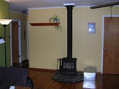 Free-standing wood-burning fireplace (installed in 2006) will readily heat the whole home. The gas f