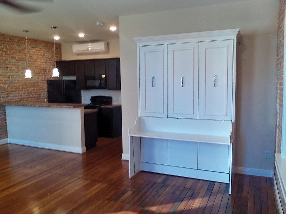 Murphy Bed Hidden in Custom Furniture
