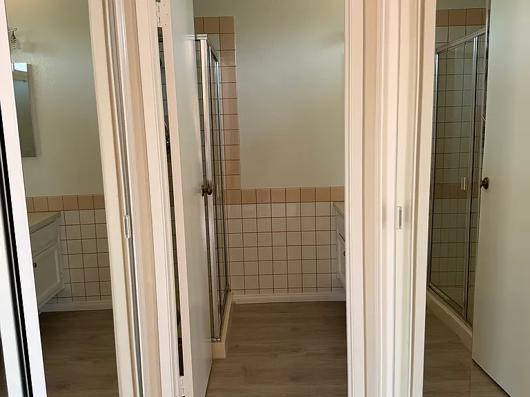 Master Bedroom Closets leading to bathroom