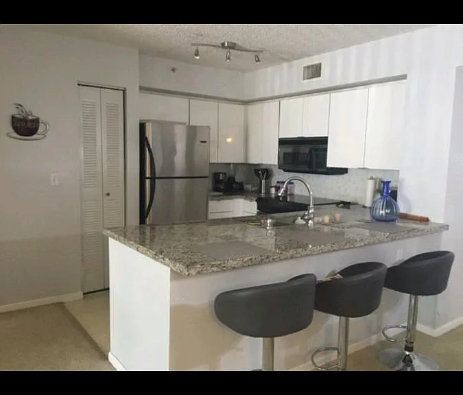 10687 SW 6th St — Photo 4
