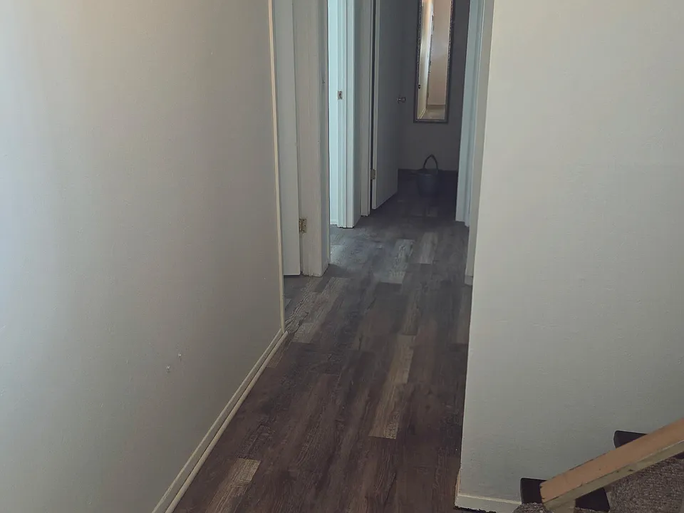First floor hallway, two bedroom, half bath, screen in outdoor area entry door two large closet on hallway
