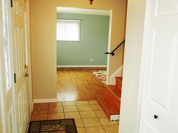 Welcoming Foyer with newer Light Fixture