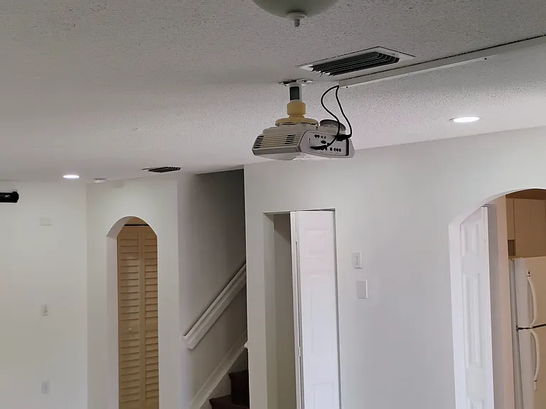 Pre-mounted ceiling projector and 120 inch pull down screen.