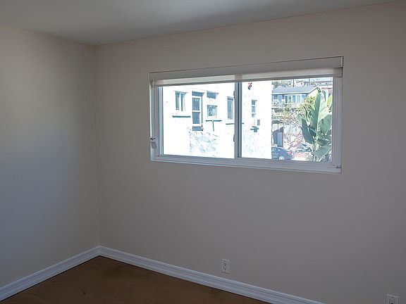 Window view of second bedroom - facing east to Manhattan Ave