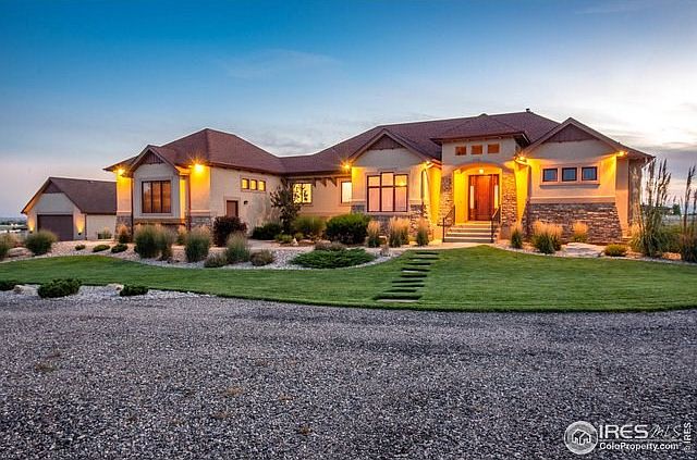 Welcome home to 39821 Hilltop Circle, Severance CO