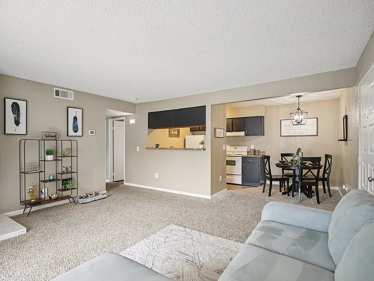 Two-bedroom living, dining and kitchen.