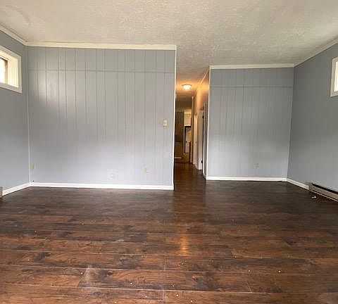 Walking through front door. First living room