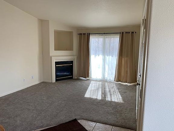 family room with gas fire place