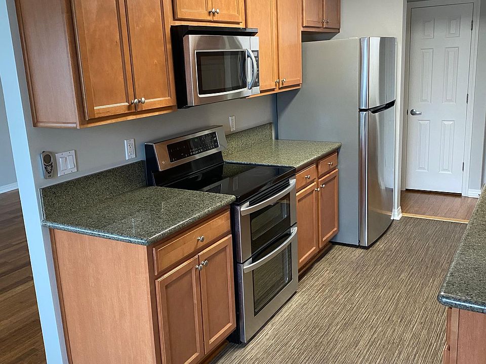Stainless Appliances In Kitchen; Double Oven, Micro, Fridge.