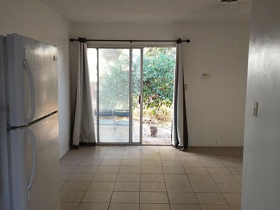 Front sliding door from kitchen and dining area.