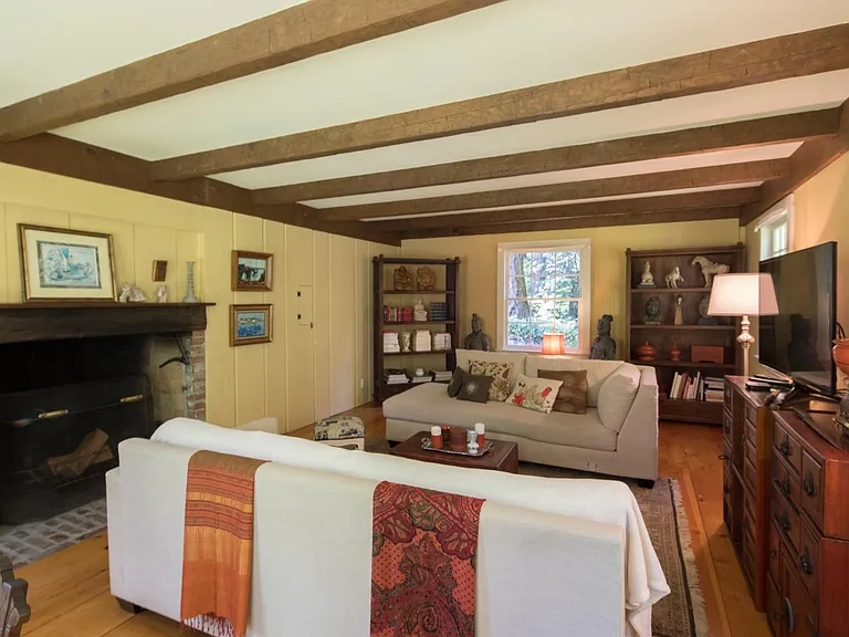 Living room with 2nd fireplace. Entrance to front hall is on left.