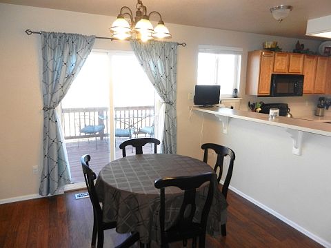Spacious eatin kitchen w walkout to deck