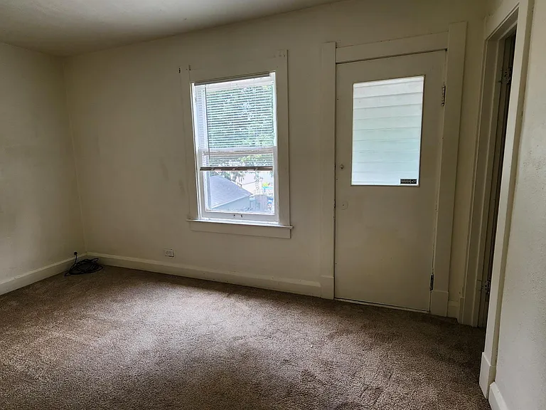 bedroom 3 carpeted and closets