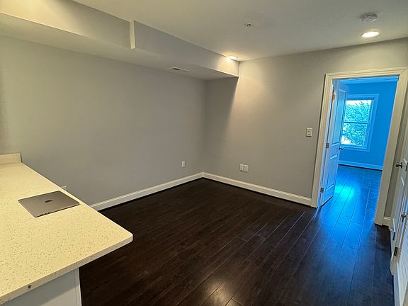 Living room connected to open kitchen