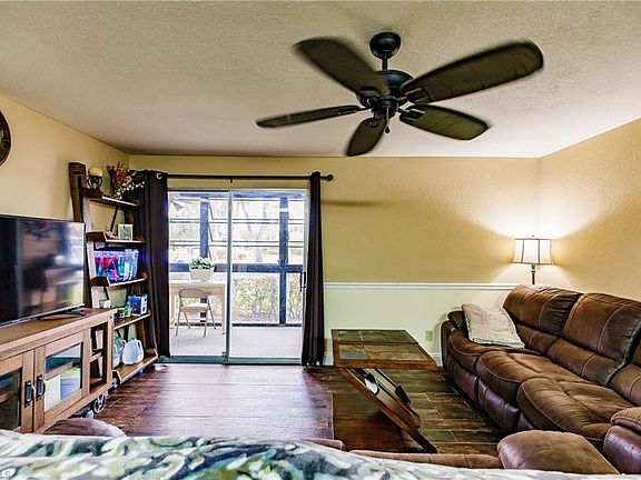 4th image of 8041 S Woods Cir Unit 4