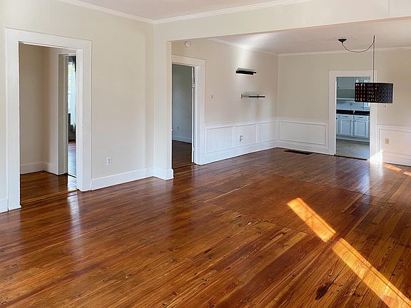 Living/Dining areas connect directly to bedrooms and kitchen