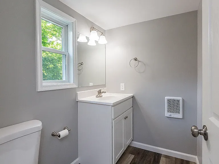 Powder room at back of house