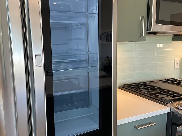 New refrigerator with light up beverage door.