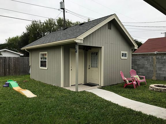 Door on the left is a Storage Shed for lawnmowers and power tools. Door on the right is the exterior apartment with a full bathroom (toilet & shower)