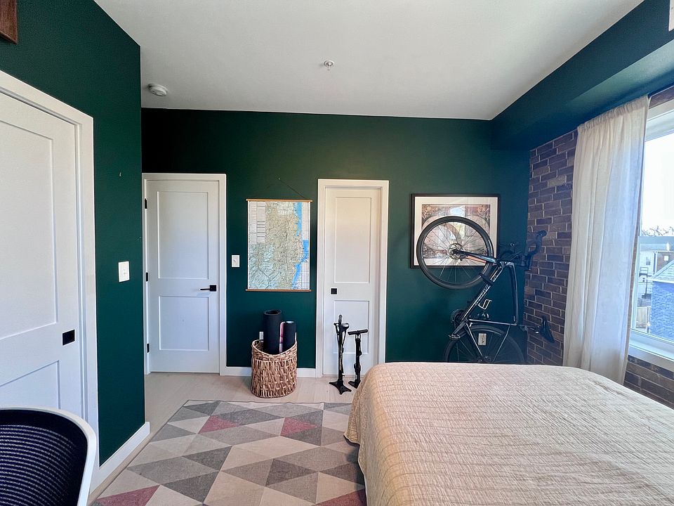 Large closet to the left, with pocket door leading to the private bathroom straight ahead.