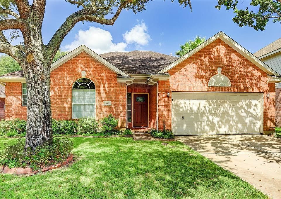 **BEFORE PHOTO** Charming Brick Exterior with Front Porch.