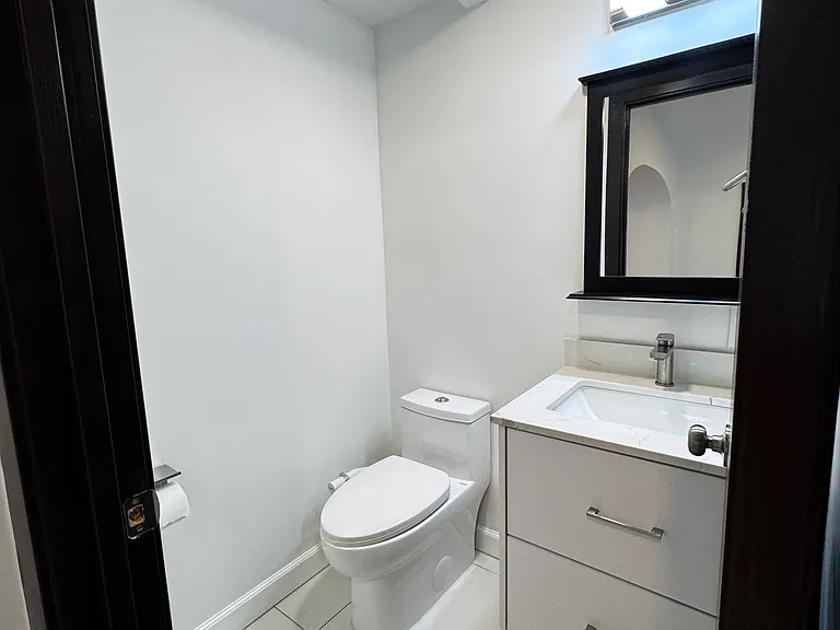 Half Bath off Entryway Hallway