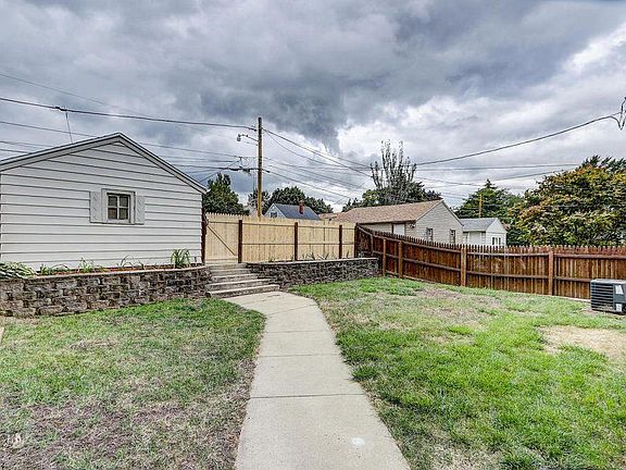 Fenced back yard. The grass has been replanted since this photo.