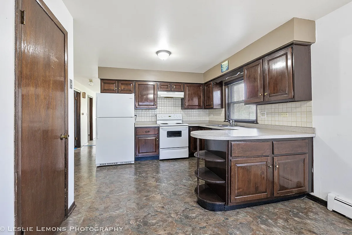 Building Photo - 4907 Spencer Ave #A1