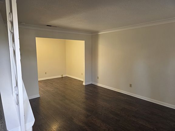 Hardwood flooring, generous living room and dining area