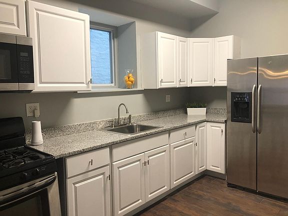Kitchen with granite countertops and stainless steel appliances