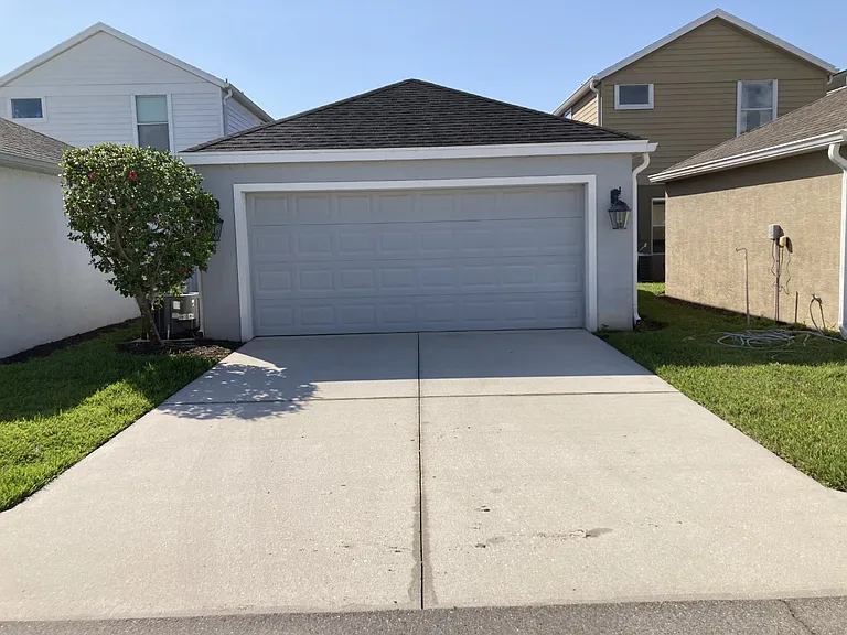 2 car garage. Extra newer refrigerator in the garage.