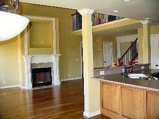 Kitchen open to family gathering areas.
