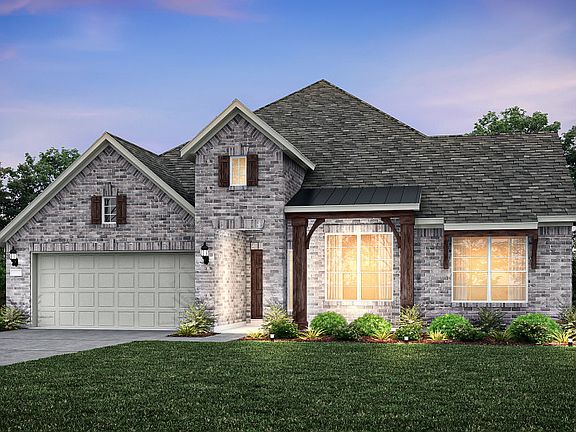 The Dunlay, a one-story home with 2-Car Garage, shown with Home Exterior E.