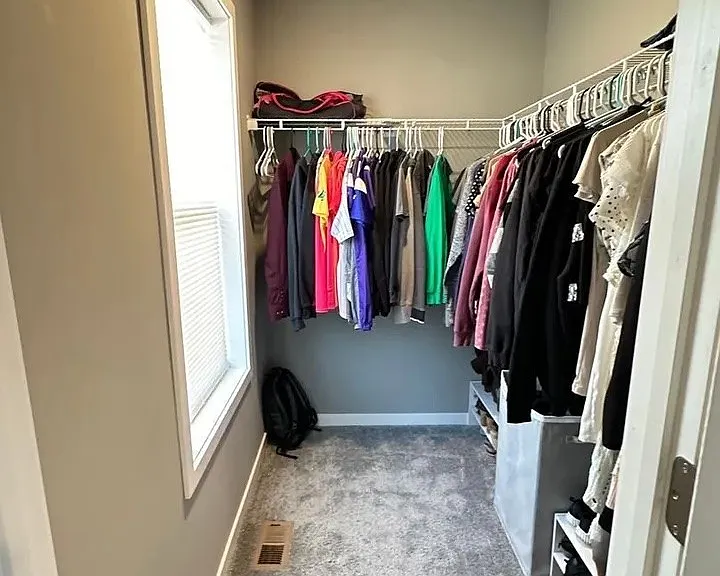 Maximize your space with this impressive walk-in closet at LS Capital Group. Featuring ample storage and a stylish design, it's perfect for organizing your wardrobe. Elevate your living experiencea"schedule a tour today!