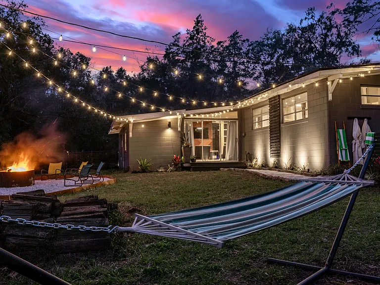 Backyard string lights and Fire Pit
