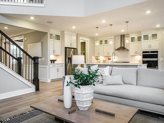 Open Concept Design Featuring Gathering Room, Kitchen and Cafe