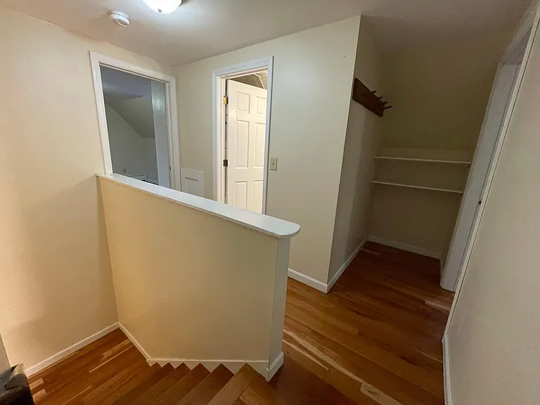 upper staircase linen storage area