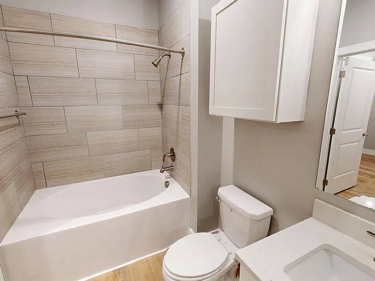 The Railyard floor plan includes a modern bathroom with a medicine cabinet and large oval bathtub. The Railyard floor plan includes a modern bathroom with a medicine cabinet and large oval bathtub.